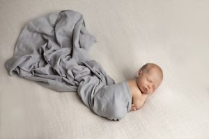 Newborn wrapped in Grey Blanket Newborn Photography Melbourne