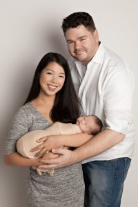 Parents holding Newborn