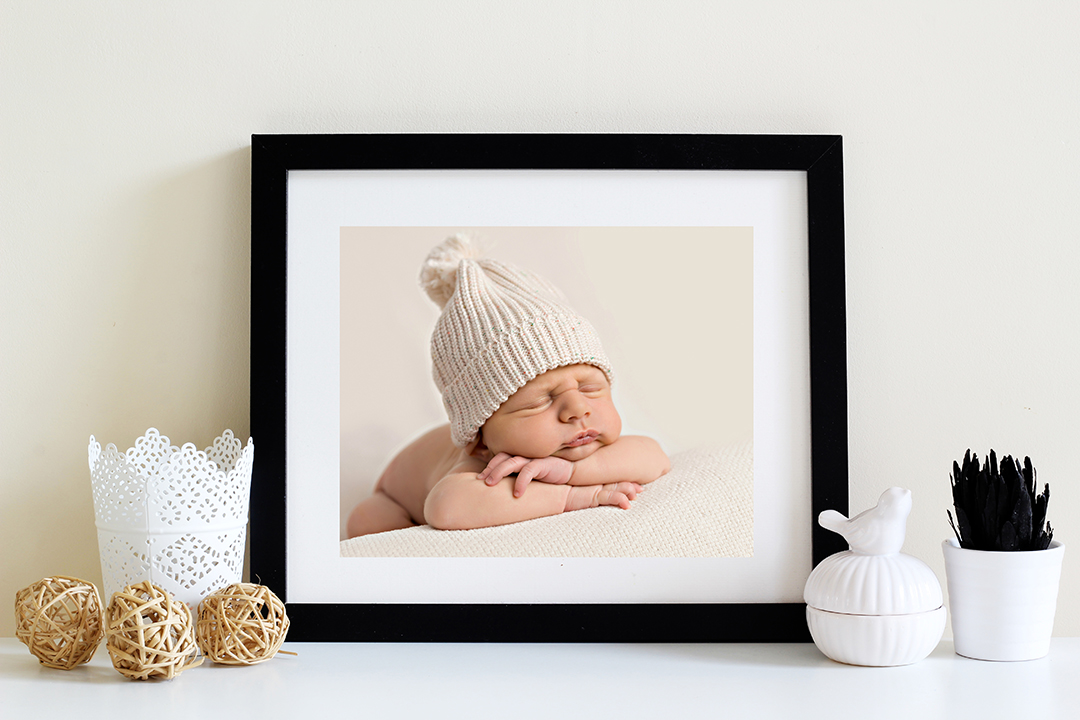 Black Frame with Newborn Baby Sleeping